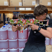 Load image into Gallery viewer, Pressure Washer Lance Rifle being held by a boy as if he was "shooting" it